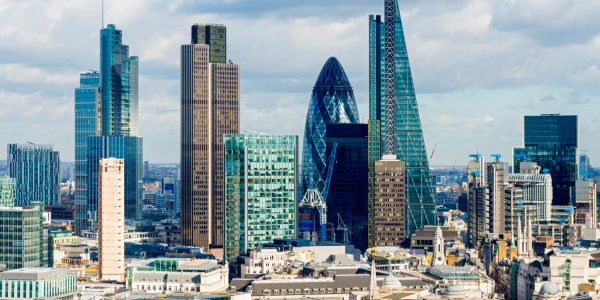 Looking across the rooftops of London towards the skyscrapers of the main financial district.